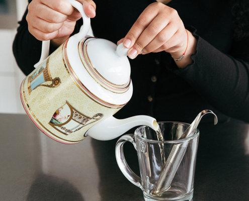 Throwing tea in a cup